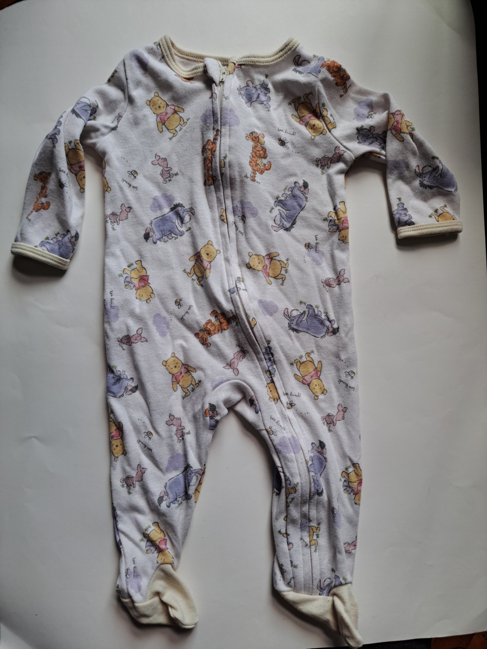 Disney Winnie the Pooh Footed One-Piece in White with Pastel Characters